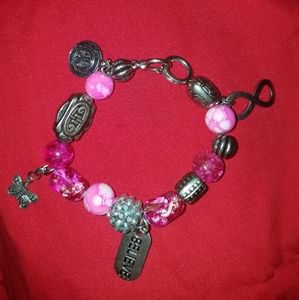 A pink charm bracelet
